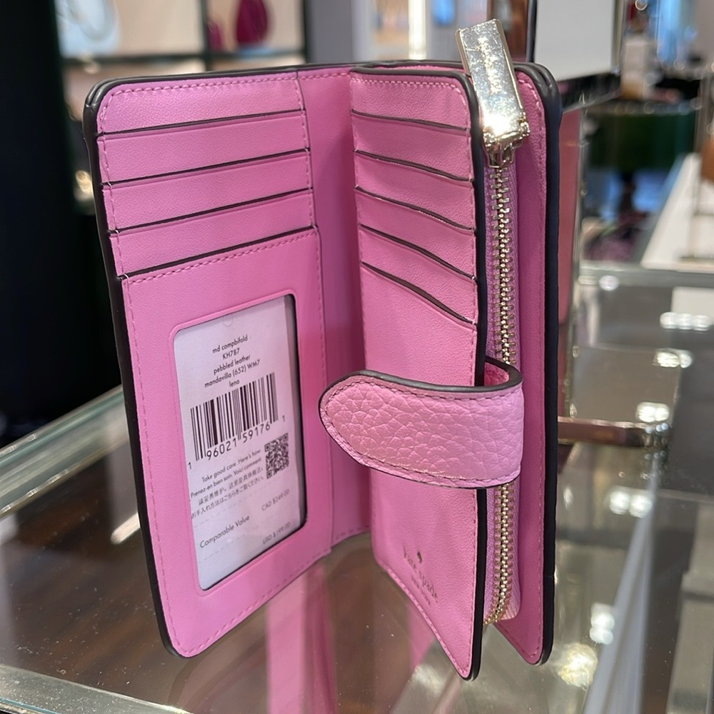 Kate Spade Lena Medium Bifold Wallet
Mandawilla
NWT - Picture 12 of 16